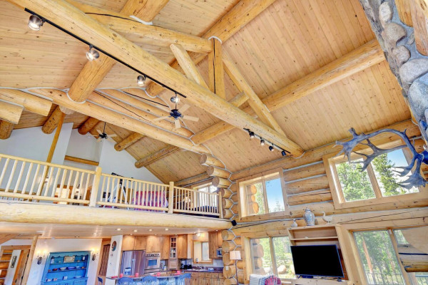 Massive log beams and vaulted ceilings.